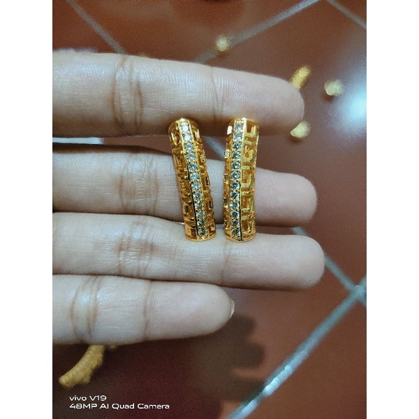 liontin gelang tangan