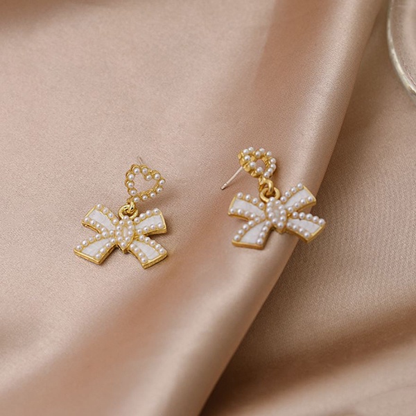 anting pita hati mutiara pearl love bow earrings jan305 (2E3)