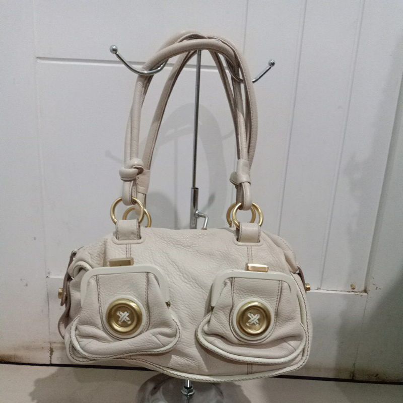 Tas Mimco button