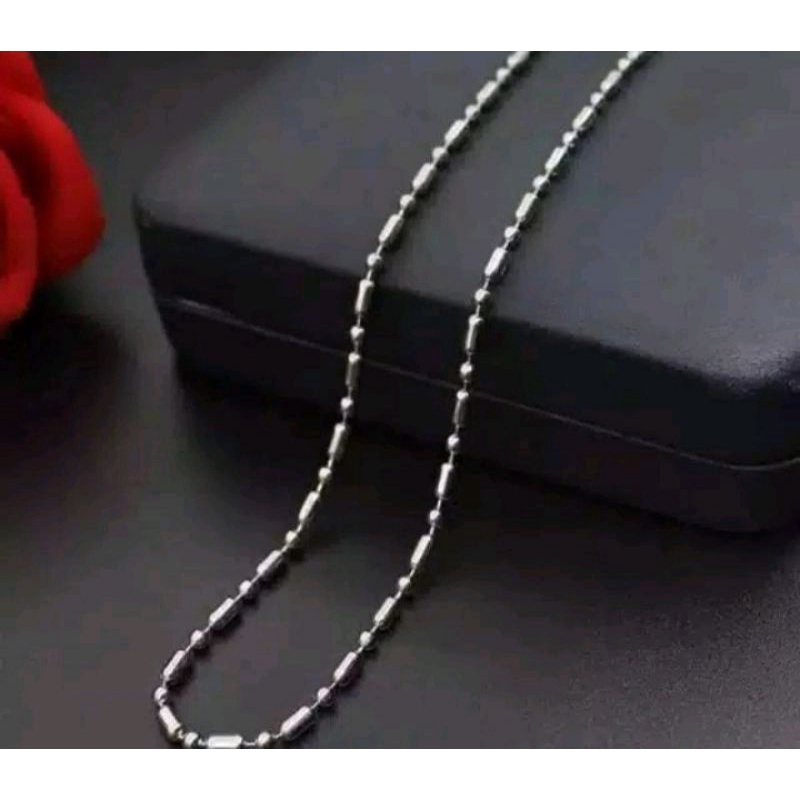 KALUNG BIJI LADA JARAK TITANIUM PRIA DAN WANITA