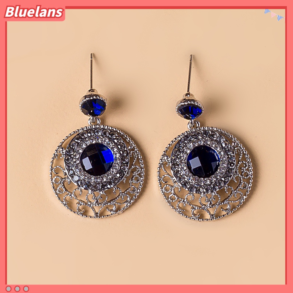 Anting Stud Bentuk Bulat Hollow Aksen Berlian Imitasi Warna Biru Untuk Wanita