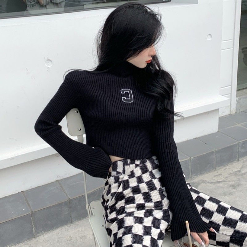 Sweater turtleneck pendek wanita 2021 musim dingin desain baru pakaian rajut niche gaya Barat kemeja