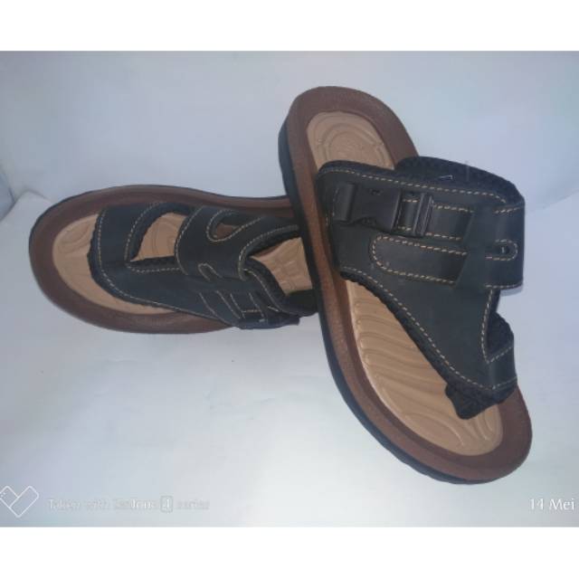 Ini sendal pria dengan bahan kulit,tiger E 331 berkwalitas bagus
