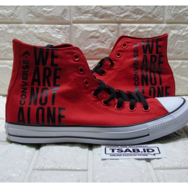 converse we are not alone red