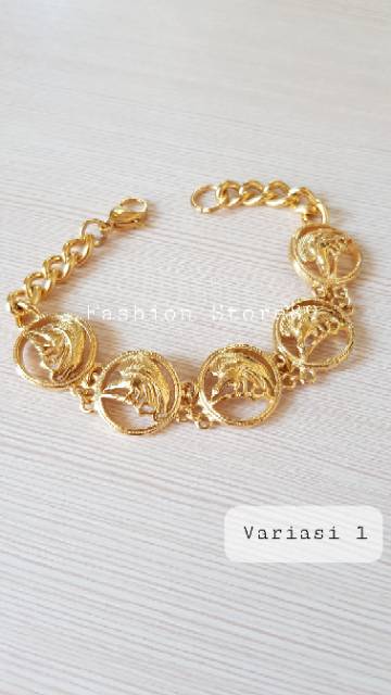 Gelang Tangan Cendrawasih / gelang import cendrawasih titanium gold antikarat import