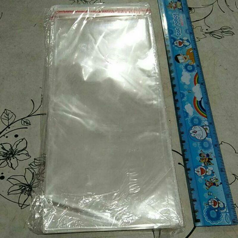 

GROSIR 400 PCS LEMBAR HELAI 4 PAK BUNGKUS SAMPUL KANTONG PLASTIK PUTIH BENING TRANSPARAN LEM PEMBUNGKUS UNDANGAN KECIL SEDANG 11x23 cm 11x23cm 17x25cm 17x25 MURAH PTK JKT