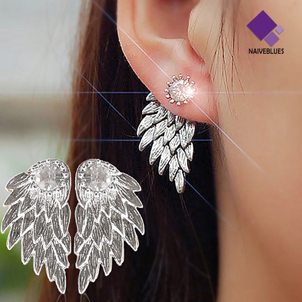 1 Pasang Anting Stud Bentuk Sayap Aksen Berlian Imitasi Bahan Alloy Untuk Wanita