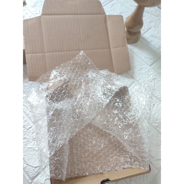 

Tambahan kardus dan bubble wrap