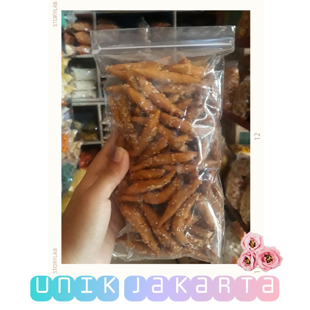 

Cemilan Stick Wijen Manis / Kue Keciput stick Wijen snack rasa manis gurih