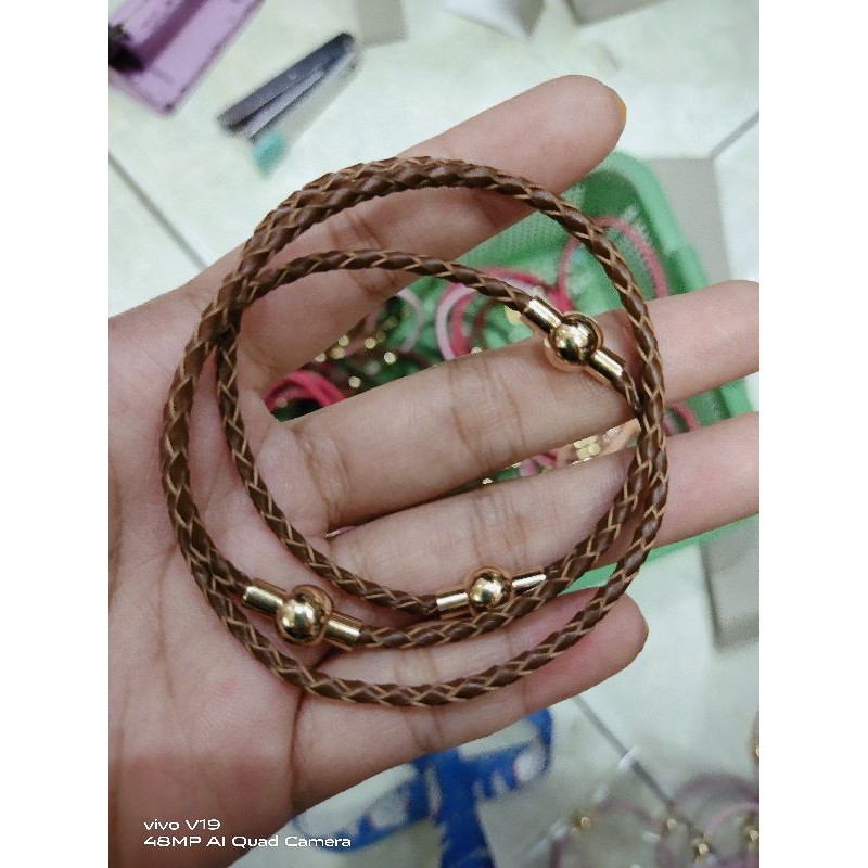 gelang tali kulit kunci magnet