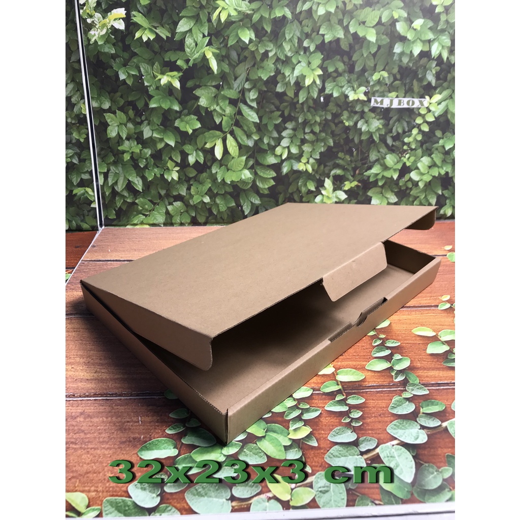 

Kardus Uk. 32 x 23 x 3 cm......Die cut untuk packing aksesoris dll, model box pizza