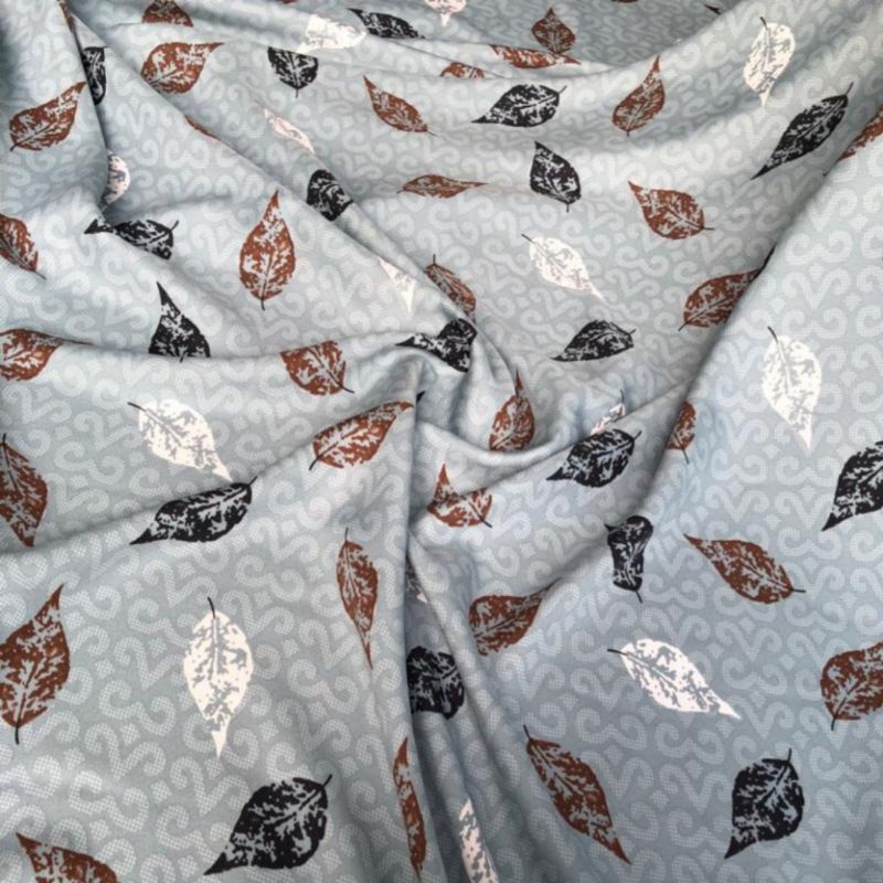 Kain Motif Shakila Daun warna warni harga setengah meter