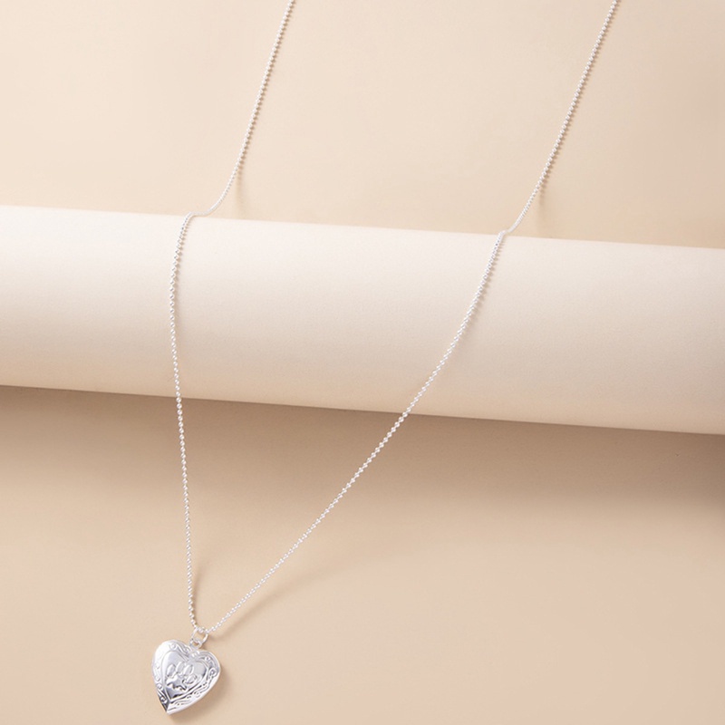 Kalung Dengan Liontin Bentuk Hati Bahan Stainless Steel Untuk Pria Dan Wanita