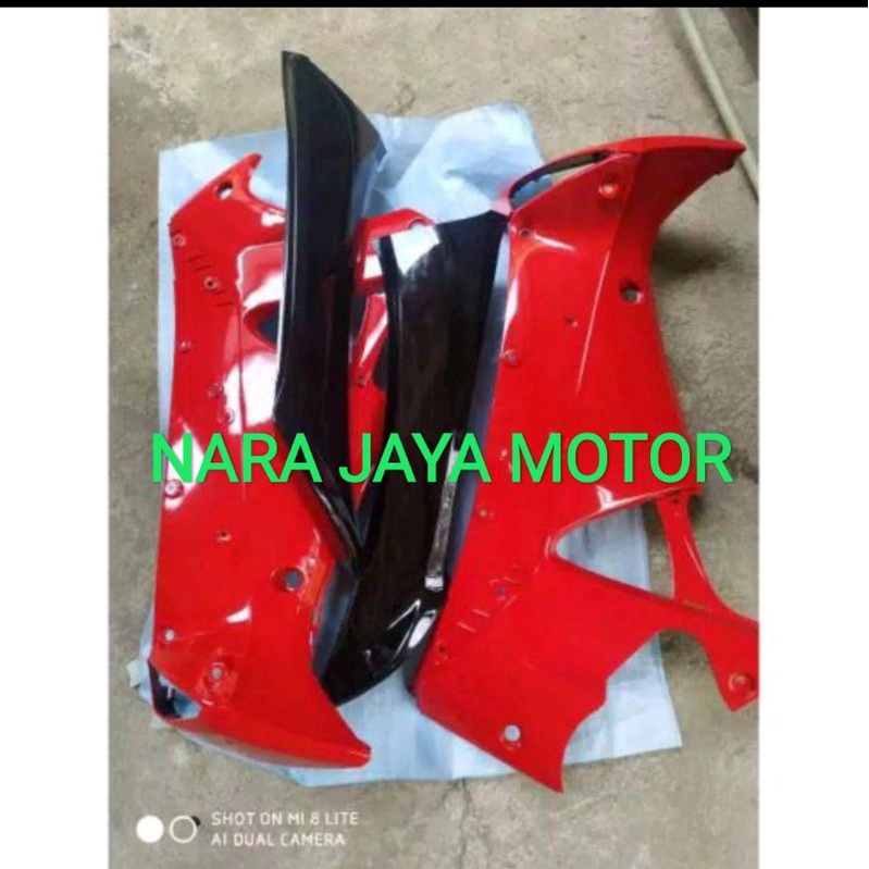 cover sayap depan samping kiri kanan supra x 125 lama 2006 merah hitam