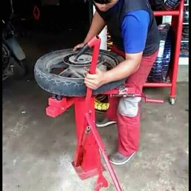 Tirechanger manual alat buka pasang ban