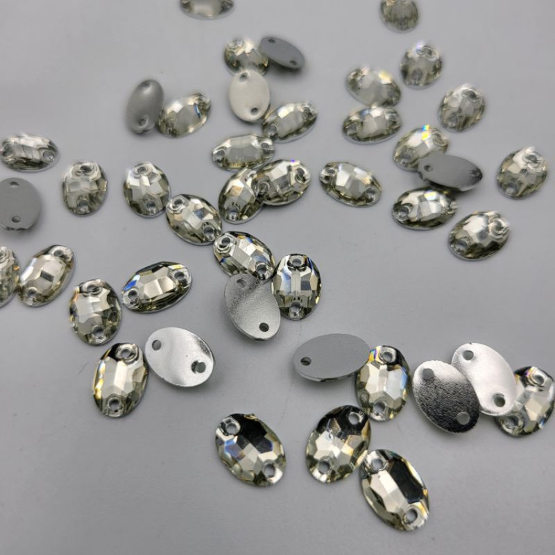 DIAMON RESIN KRISTAL MOTIF OVAL RATA UKURAN 7X10 WARNA PUTIH BERSIH KUALITAS AA KILAU BAGUS PER LUSIN