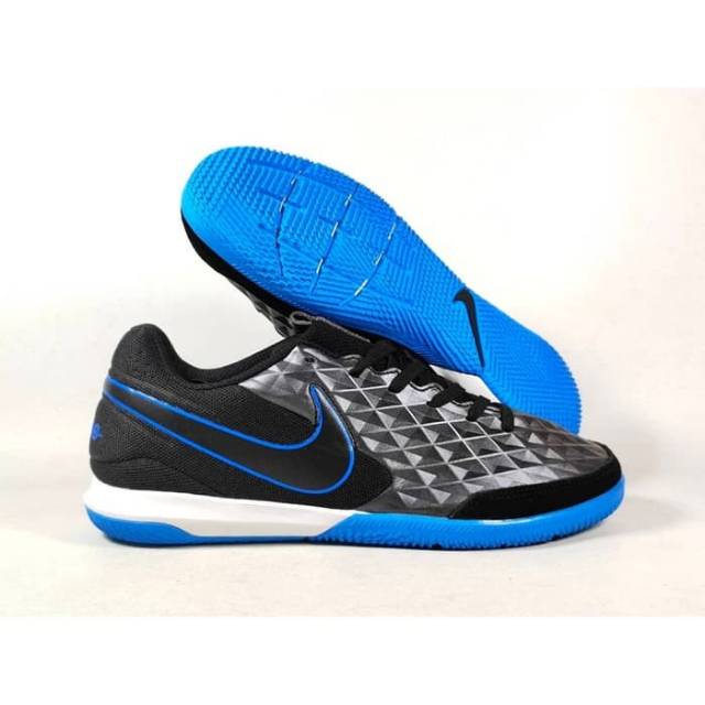 black and blue nike tiempo