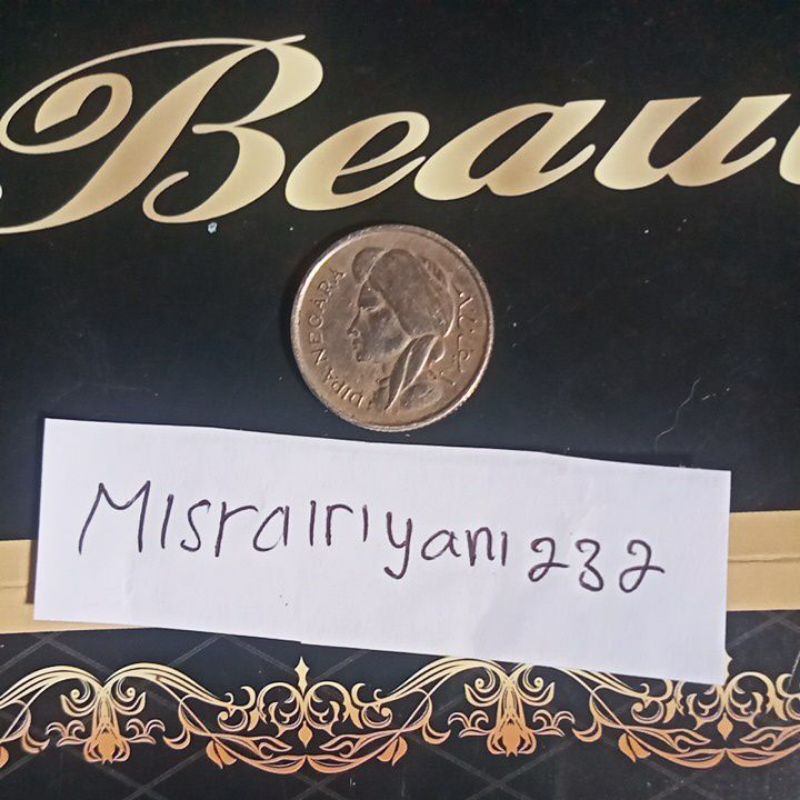 koin 50 sen dipa negara emisi tahun1952