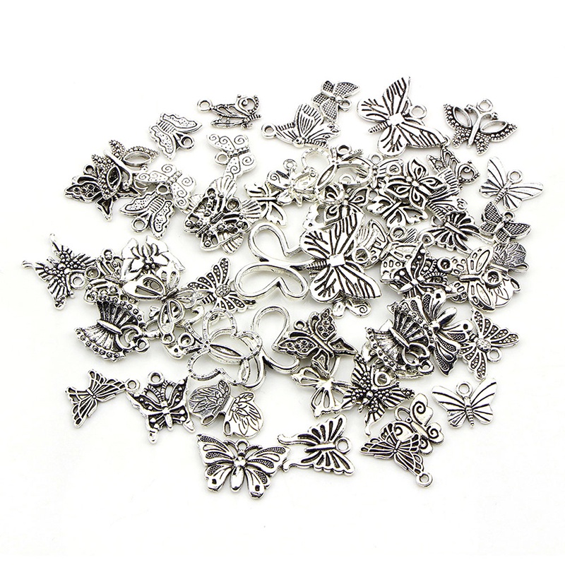 60pcs / set Liontin Bentuk Kupu-Kupu Warna Silver Gaya Vintage Tibet Untuk Perhiasan