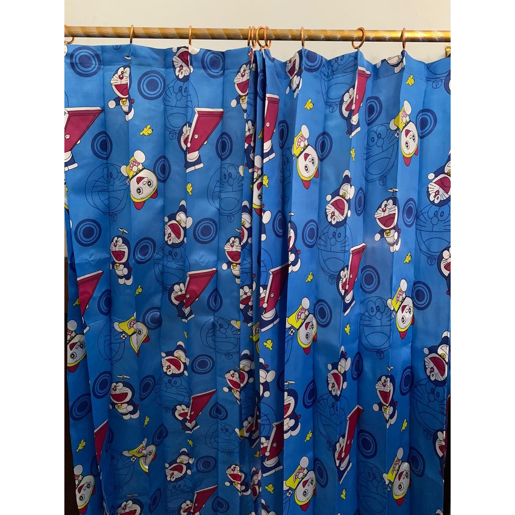 GORDEN TIRAI STOK JADI MOTIF KARAKTER DORAEMON