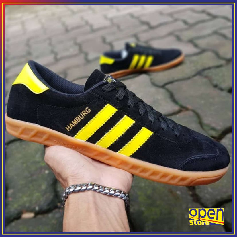 yellow and black adidas hamburgs