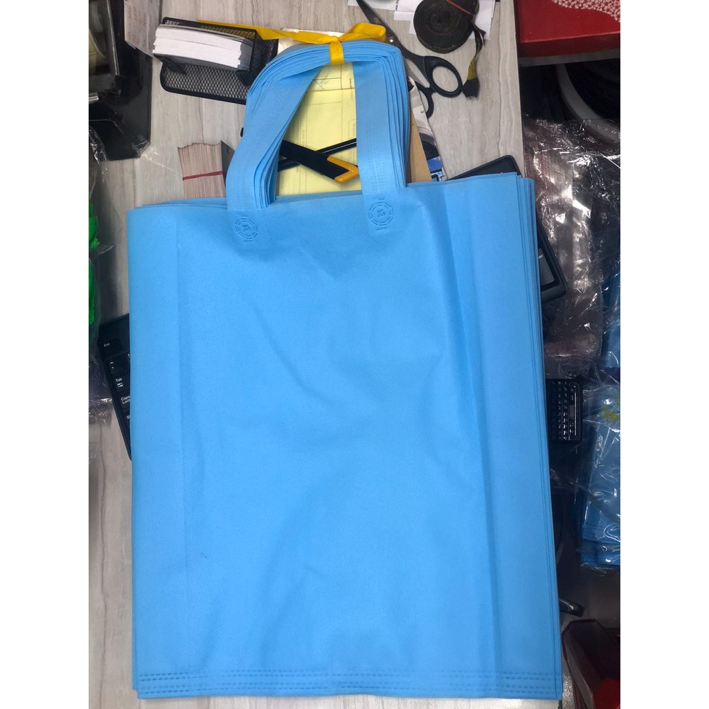 

TAS KAIN / GOODIE BAG / SPUNBOND UKURAN 38 X 45 X 9