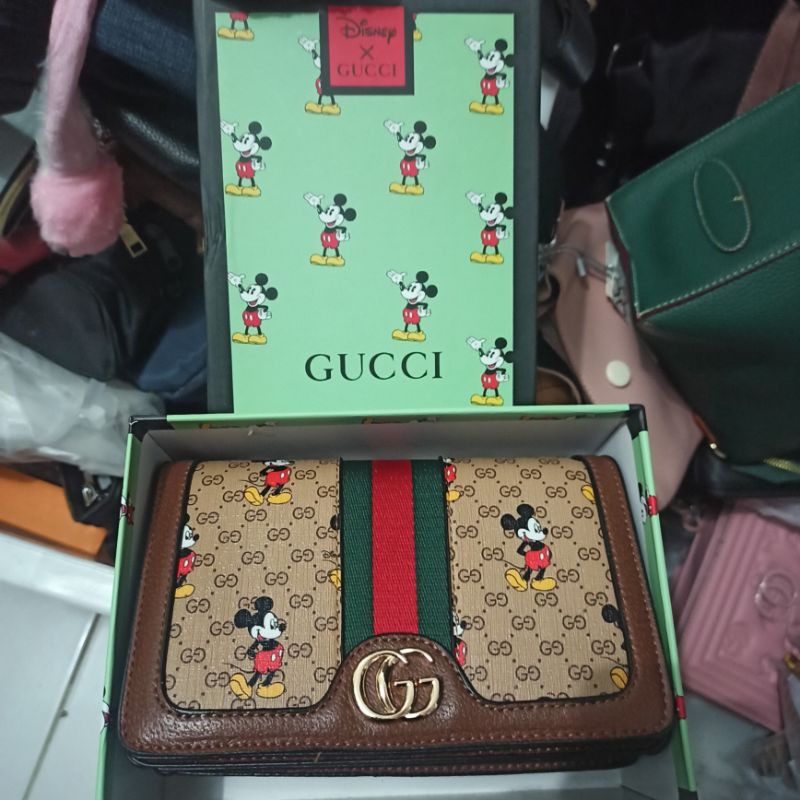 tas import Guccii