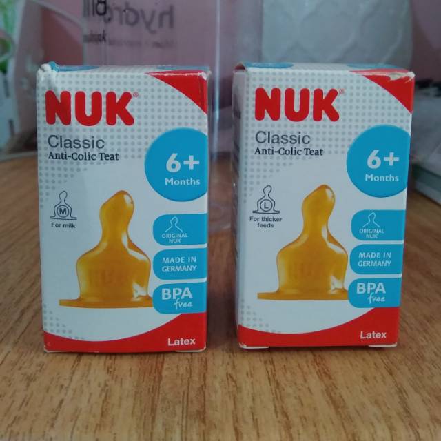 Nuk classic latex 2M & 2L rubber teat dot kuning