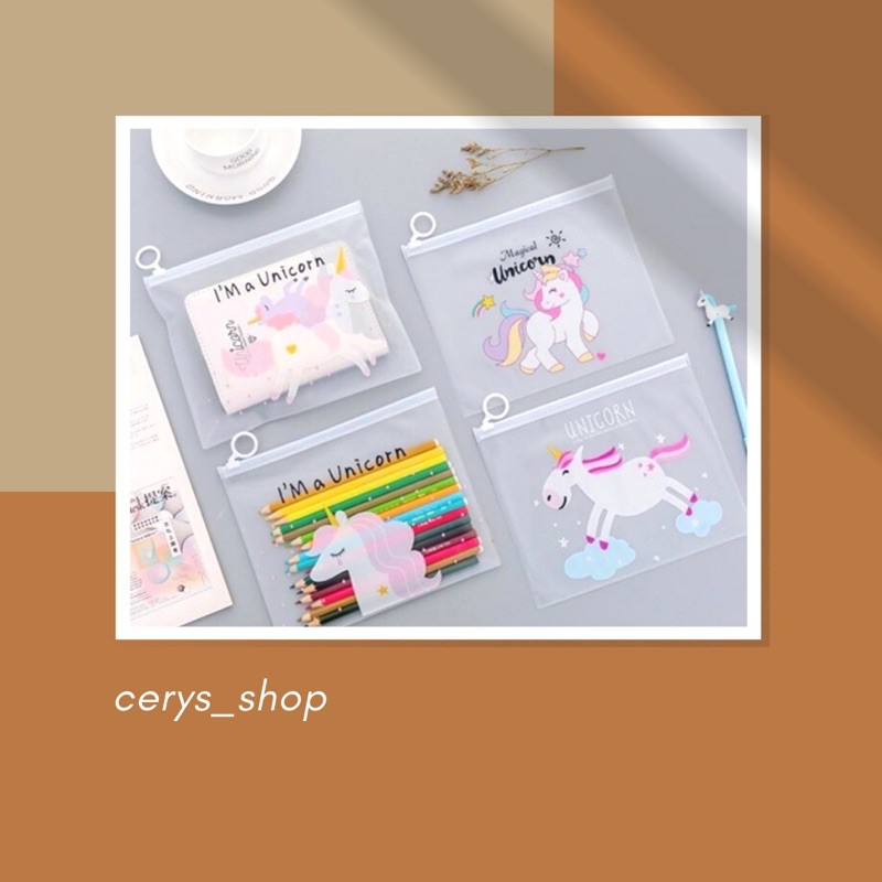 

POUCH A5 TRANSPARANT MOTIF UNICORN
