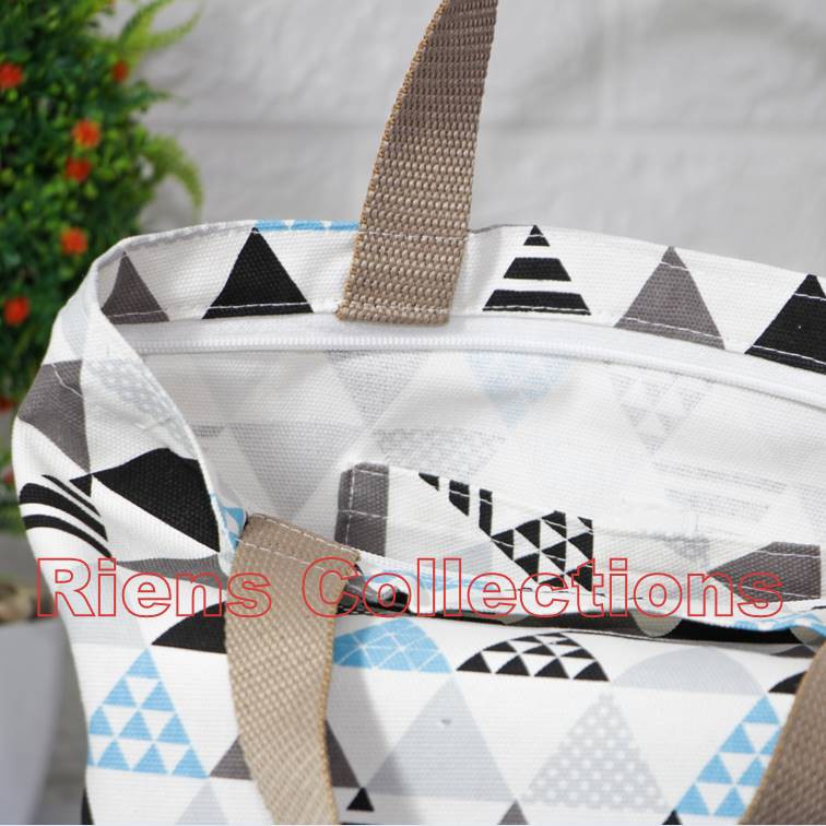 RIENS COLLECTIONS. HANDBAG BESAR BAHAN KANVAS MOTIF SEGITIGA. TAS KANVAS. HANDBAG KANVAS. TAS JOGJA. TAS SOUVENIR