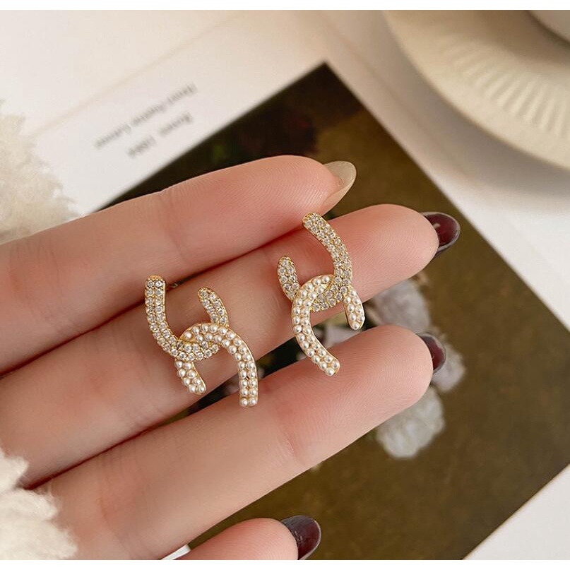 Korea kompak temperamental cross Pearl Diamond Sterling Silver Jarum stud anting-anting sederhana On