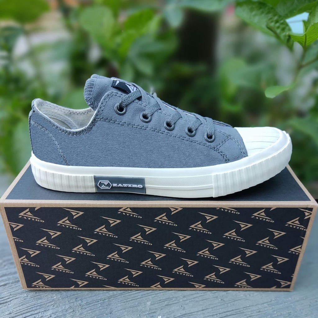 Sepatu Pria Santai Jalan Fashion Keren Distro Remaja Kuliah Trend Abu Putih Lokal Cets Basic Low Pria