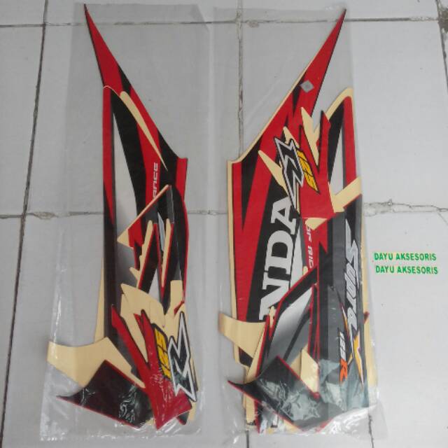 Striping Supra X 125R 2006 hitam merah