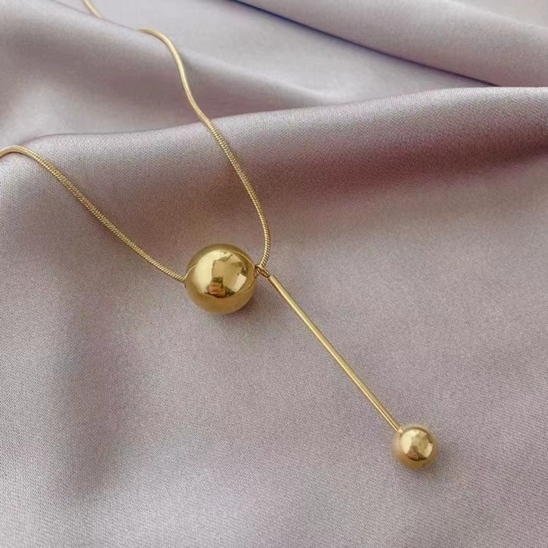 Kalung Liontin Bola Bahan Titanium Steel Warna Emas
