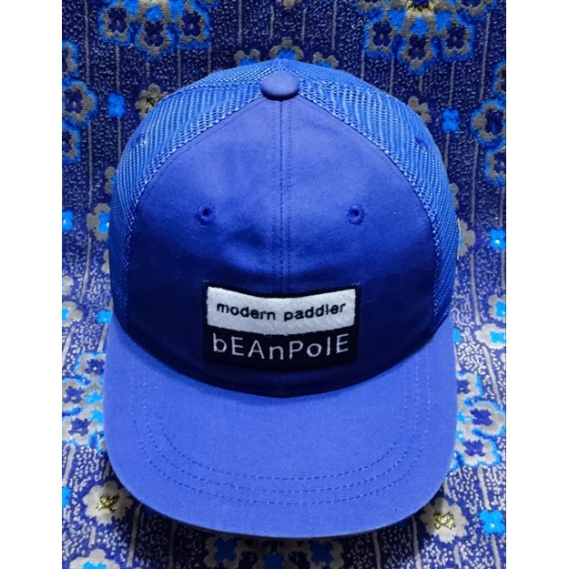 topi trucker bean pole