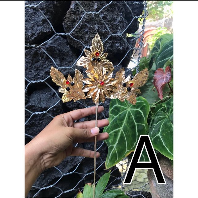 Bunga mas kap atas (adat bali)