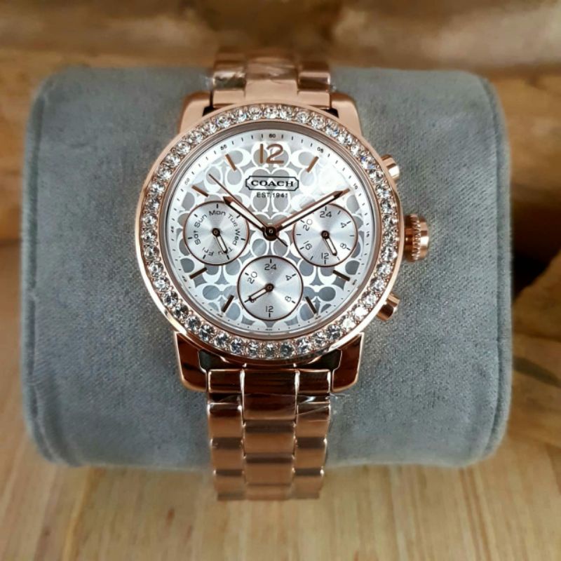 jam coach wanita stenlis