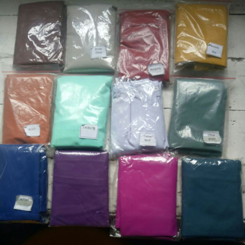 Cadar jas hujan Sheba
