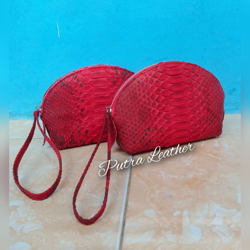 Dompet oval plong . Dompet kulit ular