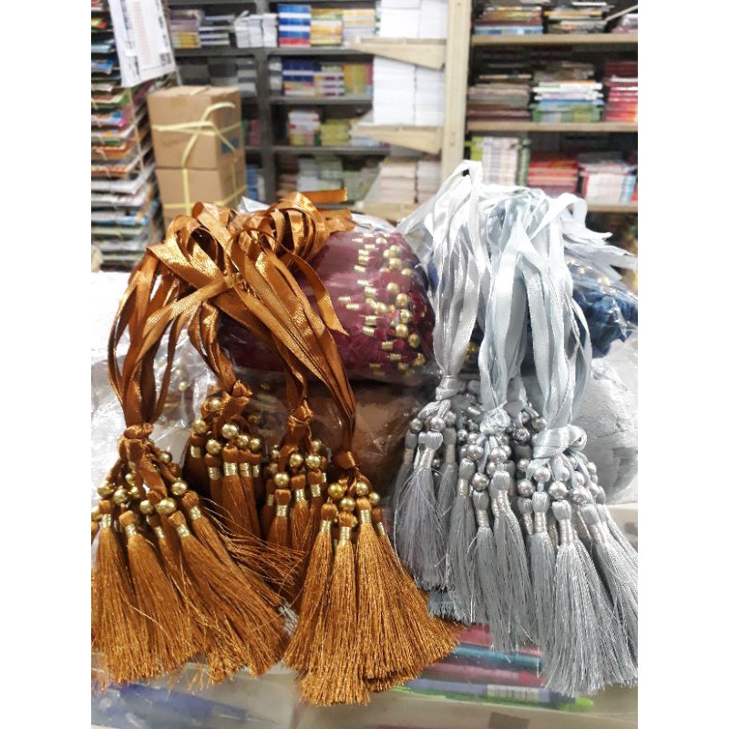 

Tali Tasel pembatas buku Yasin dll