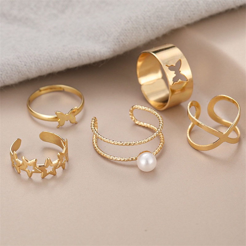 5pcs / Set Cincin Desain Kupu-Kupu Hollow Cross Aksen Mutiara Untuk Wanita