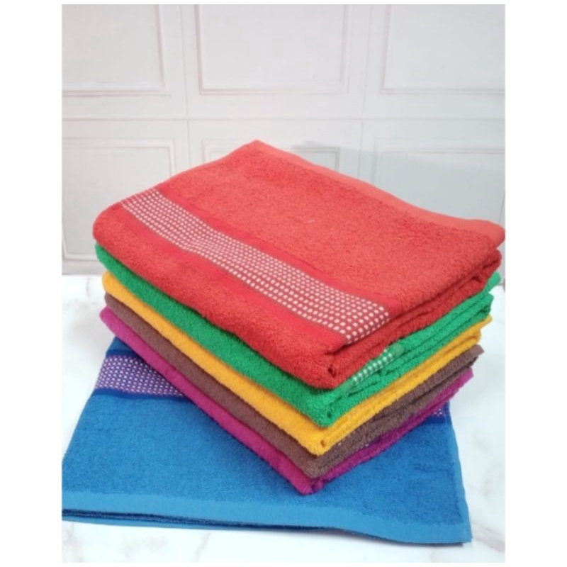 Handuk Ravioli motif tikar bahan katun lembut dan menyerap dengan cepat..