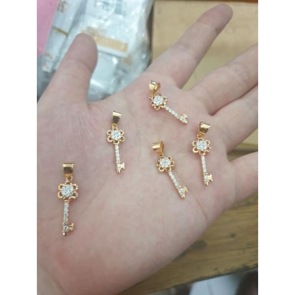 Liontin bandul pendant kecil murah kunci mata putih emas asli 375 8k