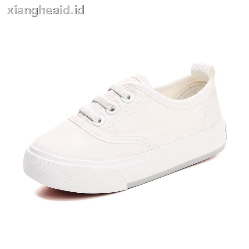 white canvas plimsolls
