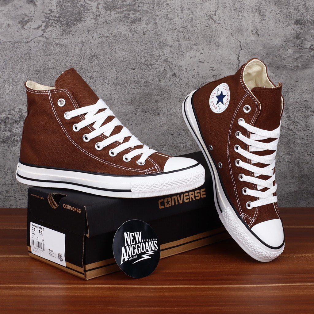 brown converse with star