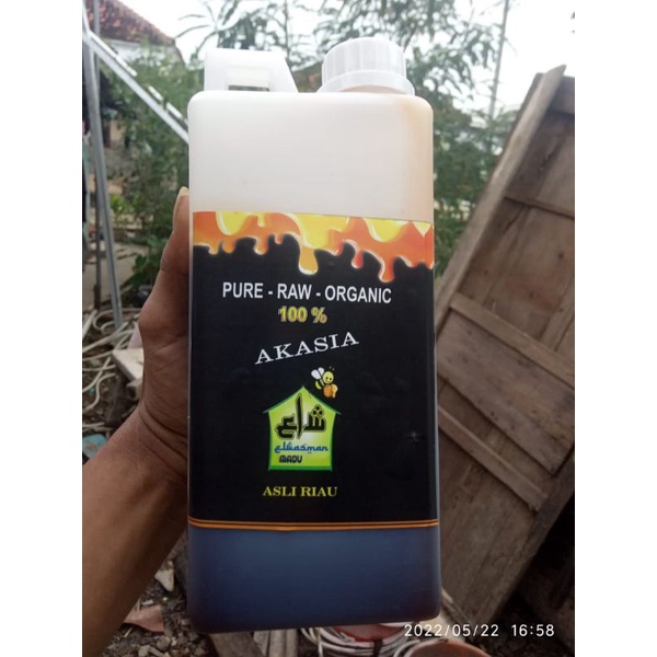 

madu asli hitam akasia