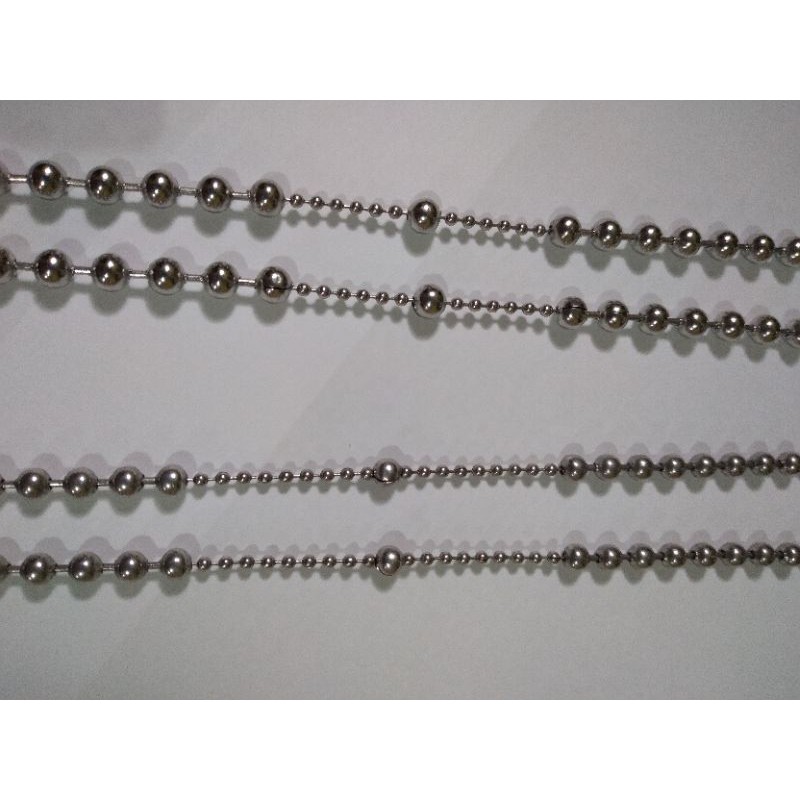 Rosario besi putih asli Maluku