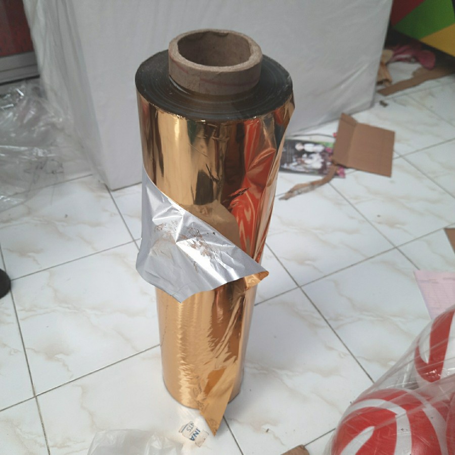 

1 ROLL (9 KG) Plastik Kado Emas Lebar 62cm Hot Stamping Susah Luntur Tatakan Tart Kaligrafi