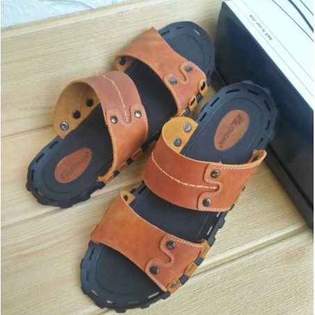 Sandal kulit pria model pria masa kini dengan bahan kulit berkwalitas
