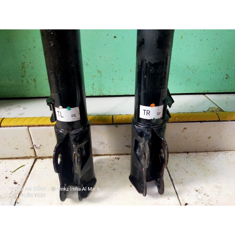 sock breaker nissan march Almera depan